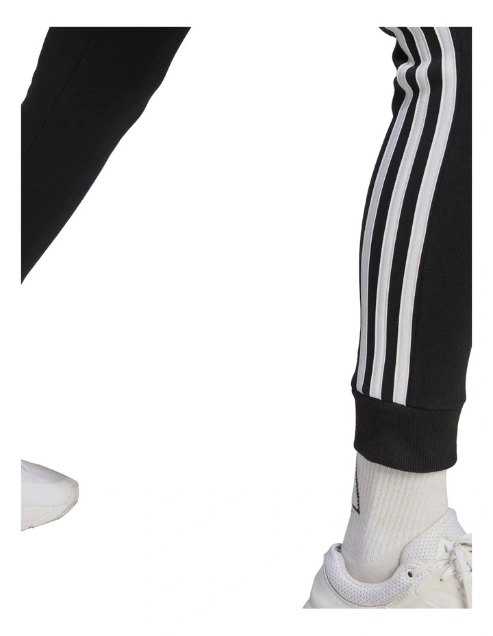 Essentials 3-Stripes Fleece Joggers in Black/White