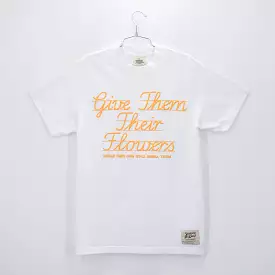 GIVE THEM THEIR FLOWERS SPELL OUT TEE WHITE