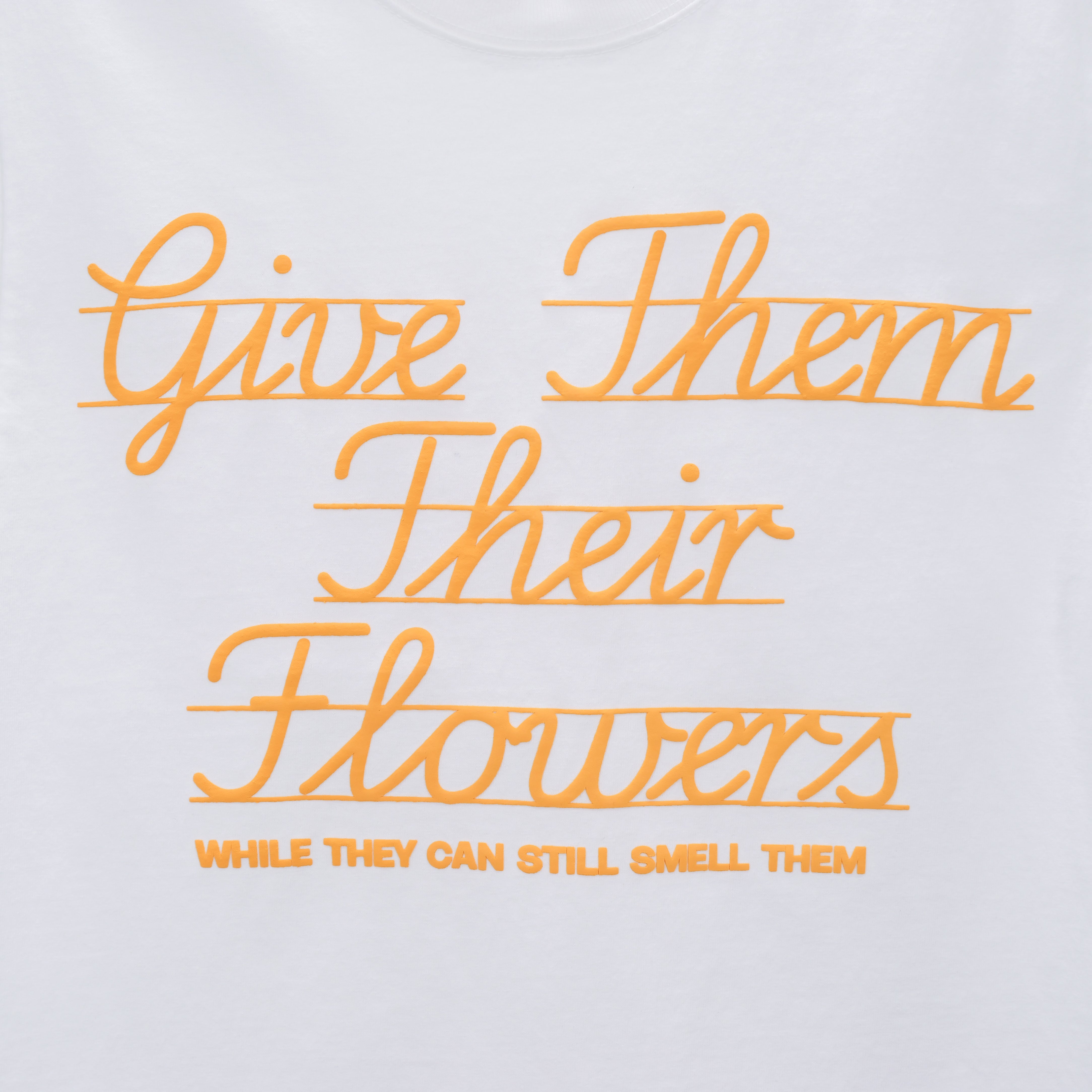 GIVE THEM THEIR FLOWERS SPELL OUT TEE WHITE